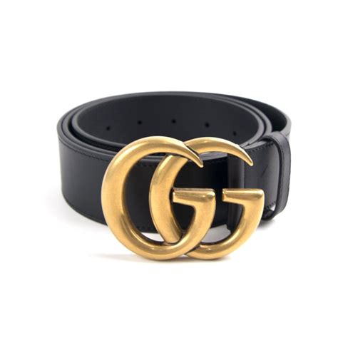 gold black gucci belt|Gucci belt with black buckle.